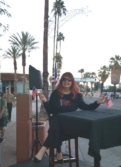 Commentating the City of Palm Springs Veterans Day Parade in front of Alibi Azul